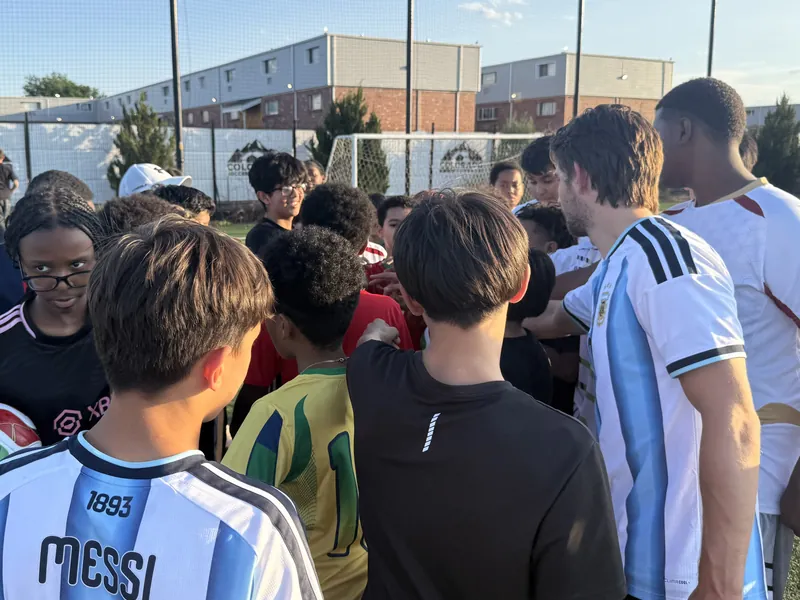 Team huddle on the field